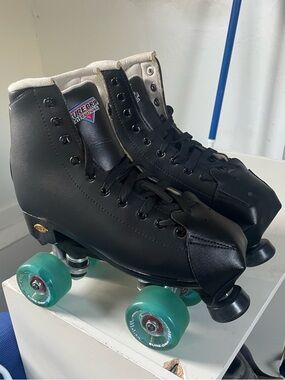 Sure-Grip Black Roller Skates with Teal Wheels